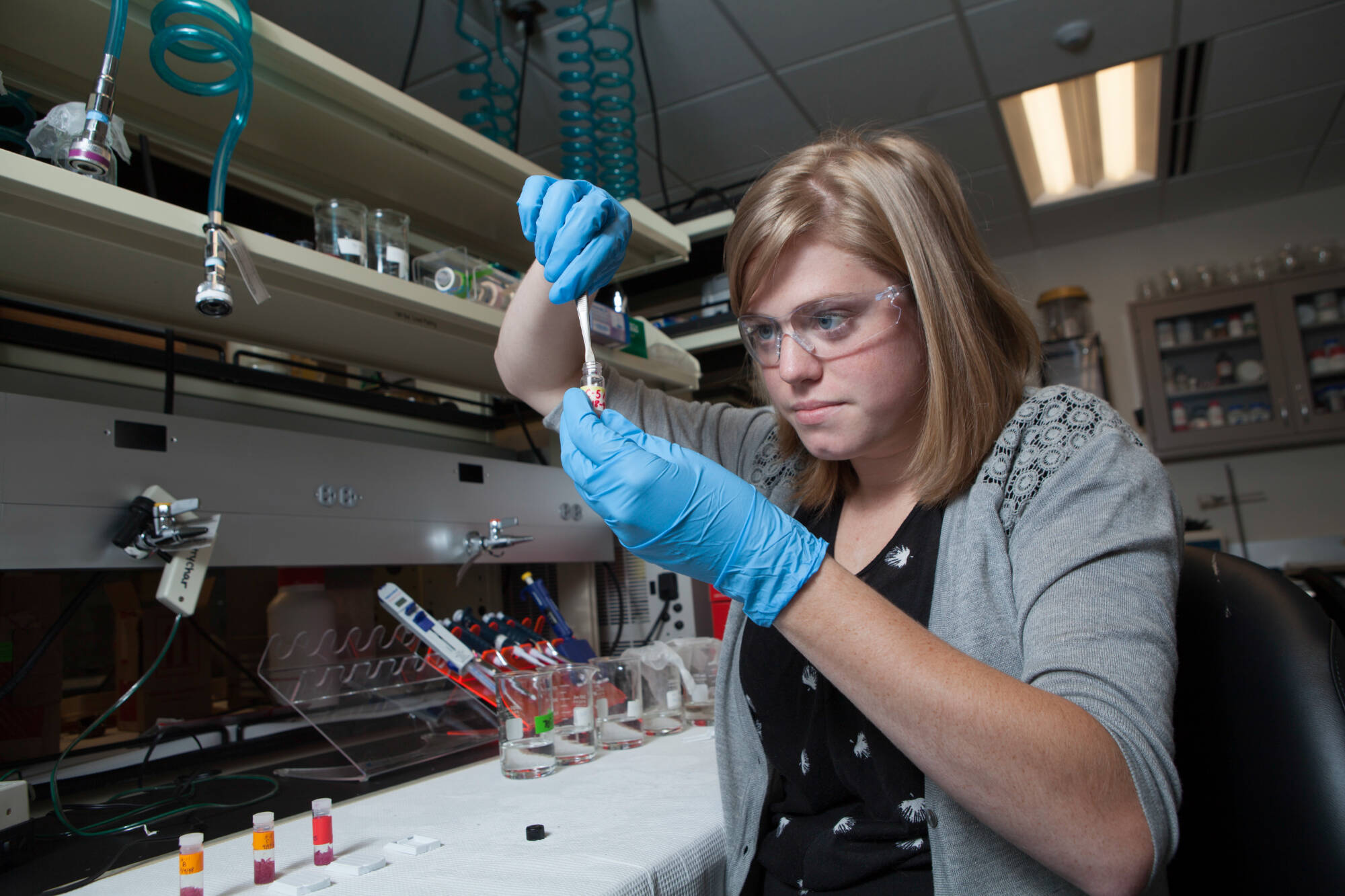 Courtney Cave process zooplankton samples at AWRI's Field Station.